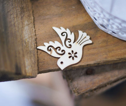 wood crafted bird art piece